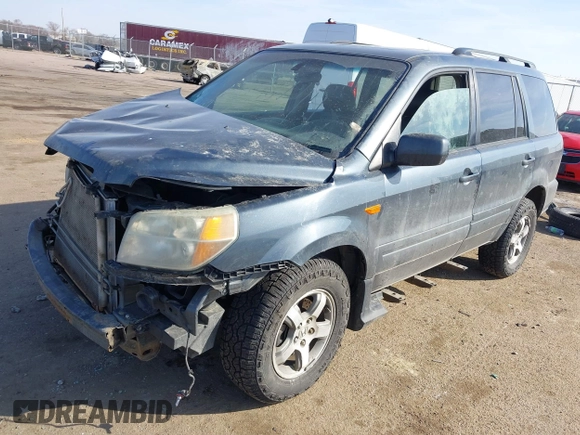 2006 Honda Pilot EX-L with VIN 5FNYF18656B012252, listed as a IAAI auction lot 41801738 with 246,191 mi miles and . Bid and sale history available at DreamBid. Image 18.
