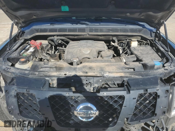 2014 Nissan Armada Platinum z VIN 5N1BA0NF8EN610303, wystawiony jako Copart lot #80653974 z przebiegiem 119 723 mil mil oraz Szkoda całkowita • Salvage title. Historia ofert i sprzedaży dostępna na DreamBid. Obrazek 13.