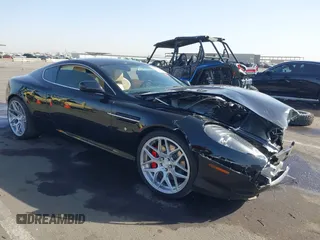 2007 Aston Martin DB9 z VIN SCFAD01A07GA07097, wystawiony jako IAAI lot #41694612 z przebiegiem 48 730 mil mil oraz . Historia ofert i sprzedaży dostępna na DreamBid. Obrazek 1.