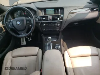 2015 BMW X4 xDrive35i with VIN 5UXXW5C59F0E87517, listed as a Copart auction lot 59604445 with 185,064 mi miles and Salvage title. Bid and sale history available at DreamBid. Image 8.