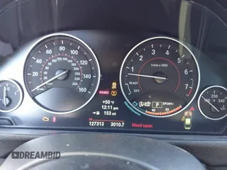 2014 BMW 3 Series 335i xDrive with VIN WBA3B9G50ENR91754, listed as a IAAI auction lot 41430306 with 127,313 mi miles and . Bid and sale history available at carsss.com. Image 7.