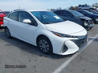 2021 Toyota Prius LE with VIN JTDKAMFP7M3197111, listed as a IAAI auction lot 42031569 with 240,098 mi miles and . Bid and sale history available at DreamBid. Image 1.