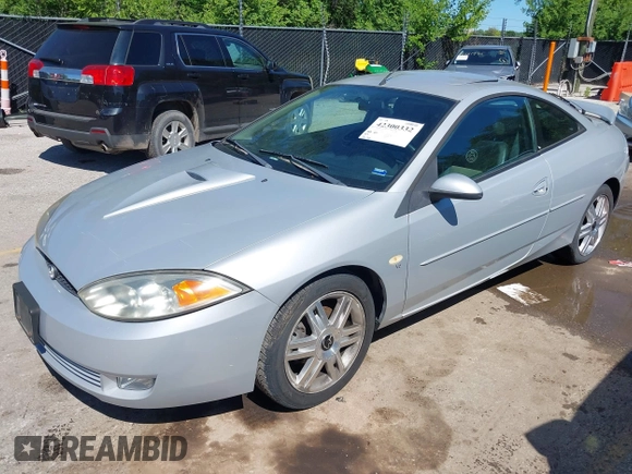 2002 Mercury Cougar z VIN 1ZWHT61L525621044, wystawiony jako IAAI lot #42300332 z przebiegiem 70 134 mil mil oraz . Historia ofert i sprzedaży dostępna na DreamBid. Obrazek 2.
