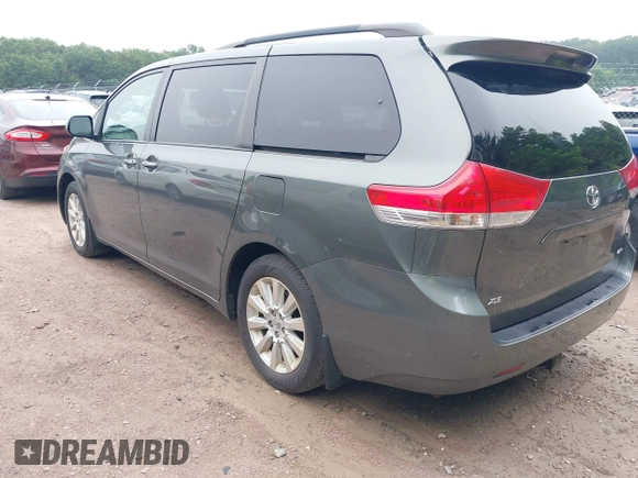 2014 Toyota Sienna Limited with VIN 5TDDK3DC5ES083785, listed as a IAAI auction lot 42559682 with 168,244 mi miles and . Bid and sale history available at DreamBid. Image 3.