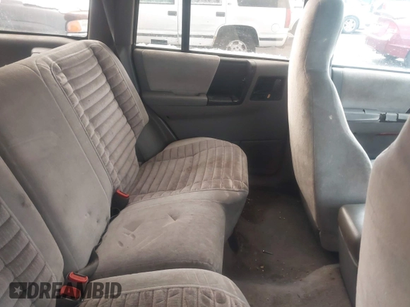 1993 Jeep Grand Cherokee Laredo with VIN 1J4GZ58Y9PC583439, listed as a IAAI auction lot 41794732 with 211,691 mi miles and . Bid and sale history available at DreamBid. Image 8.