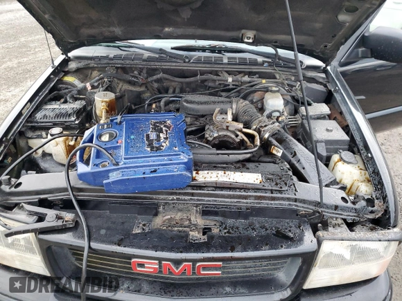 2000 Chevrolet Blazer LS z VIN 1GNCT18W1YK151830, wystawiony jako Copart lot #88799235 z przebiegiem 190 019 mil mil oraz Nie do naprawy • Non repairable. Historia ofert i sprzedaży dostępna na DreamBid. Obrazek 13.