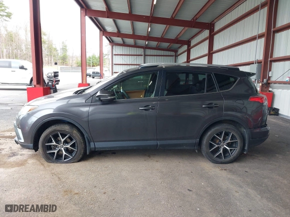 2016 Toyota RAV4 SE with VIN JTMJFREV7GJ072488, listed as a IAAI auction lot 42031254 with 106,901 mi miles. Bid and sale history available at carsss.com. Image 14.