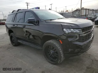 2022 Chevrolet Tahoe RST with VIN 1GNSKRKL9NR244044, listed as a Copart auction lot 84672734 with 33,845 mi miles and Salvage Title. Bid and sale history available at carsss.com. Image 4.