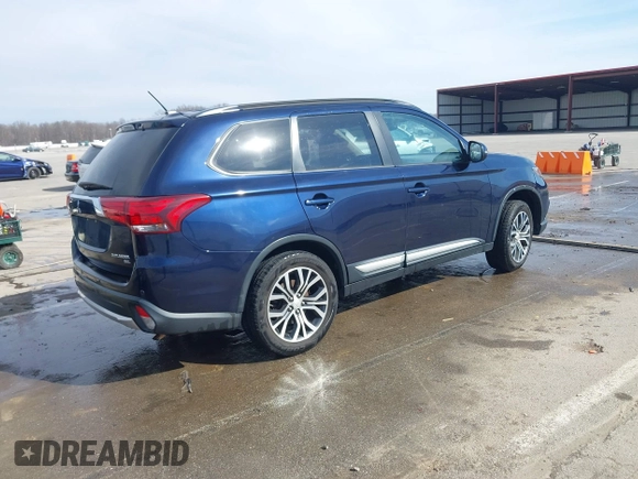 2016 Mitsubishi Outlander SE with VIN JA4AZ3A32GZ064867, listed as a IAAI auction lot 41599000 with 113,159 mi miles and . Bid and sale history available at DreamBid. Image 4.