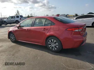 2021 Toyota Corolla Hybrid LE with VIN JTDEAMDE5MJ012662, listed as a Copart auction lot 52142455 with 138,564 mi miles and Clean Title. Bid and sale history available at carsss.com. Image 2.