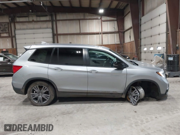 2021 Honda Passport EX-L with VIN 5FNYF8H56MB000107, listed as a IAAI auction lot 41868429 with 66,572 mi miles and . Bid and sale history available at DreamBid. Image 14.