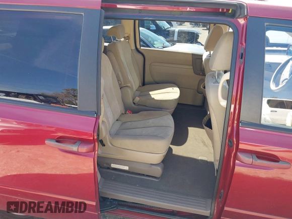2009 Kia Sedona LX with VIN KNDMB233296307113, listed as a IAAI auction lot 41696813 with 121,722 mi miles. Bid and sale history available at carsss.com. Image 8.