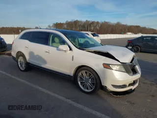 2013 Lincoln MKT EcoBoost with VIN 2LMHJ5AT1DBL54894, listed as a IAAI auction lot 40848225 with 173,147 mi miles. Bid and sale history available at carsss.com. Image 1.