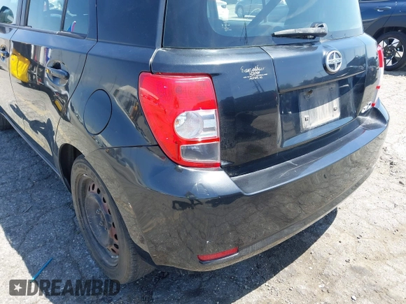 2008 Scion xD with VIN JTKKU10438J014799, listed as a IAAI auction lot 42107563 with 215,136 mi miles. Bid and sale history available at carsss.com. Image 6.