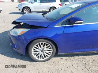 2014 Ford Focus Titanium with VIN 1FADP3J26EL179266, listed as a IAAI auction lot 42712701 with 157,897 mi miles and . Bid and sale history available at DreamBid. Image 6.