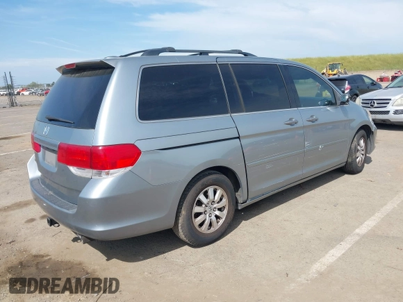 2009 Honda Odyssey EX-L with VIN 5FNRL387X9B055362, listed as a IAAI auction lot 42051881 with 139,172 mi miles and . Bid and sale history available at DreamBid. Image 4.