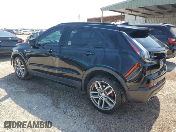 2021 Cadillac XT4 FWD Sport with VIN 1GYFZER44MF015908, listed as a Copart auction lot 52214925 with 94,079 mi miles and Clean Title. Bid and sale history available at carsss.com. Image 2.