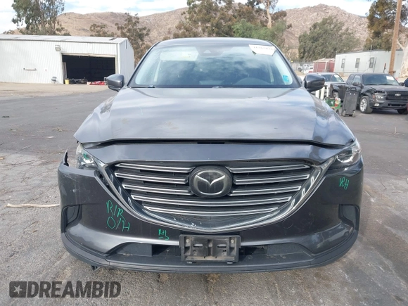 2018 Mazda CX-9 Sport with VIN JM3TCABY1J0224741, listed as a IAAI auction lot 41265876 with 126,686 mi miles and . Bid and sale history available at DreamBid. Image 13.