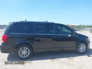 2019 Dodge Grand Caravan SXT with VIN 2C4RDGCG5KR739144, listed as a IAAI auction lot 42175888 with 43,577 mi miles and . Bid and sale history available at DreamBid. Image 13.