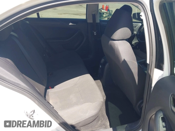 2014 Volkswagen Jetta S z VIN 3VW2K7AJ4EM415553, wystawiony jako IAAI lot #41971067 z przebiegiem 143 235 mil mil oraz . Historia ofert i sprzedaży dostępna na DreamBid. Obrazek 8.
