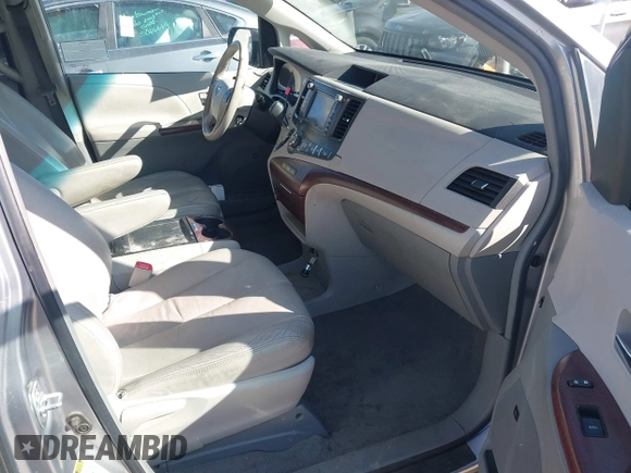 2011 Toyota Sienna XLE AAS with VIN 5TDYK3DC4BS014986, listed as a IAAI auction lot 41763681 with 169,619 mi miles. Bid and sale history available at carsss.com. Image 5.