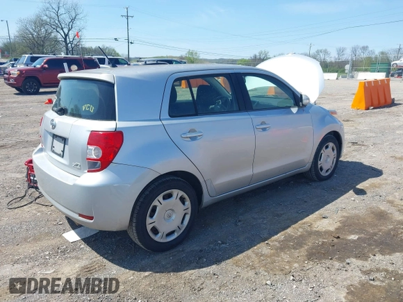 2008 Scion xD with VIN JTKKU10498J016301, listed as a IAAI auction lot 42010128 with 175,225 mi miles. Bid and sale history available at carsss.com. Image 4.