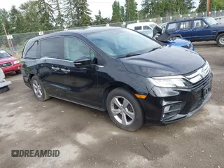 2018 Honda Odyssey EX-L z VIN 5FNRL6H76JB004527, wystawiony jako IAAI lot #42232115 z przebiegiem 83 354 mil mil oraz . Historia ofert i sprzedaży dostępna na DreamBid. Obrazek 1.