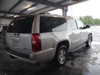 2007 Chevrolet Suburban LS with VIN 1GNFC16067J219667, listed as a IAAI auction lot 41900333 with 1 mi miles. Bid and sale history available at carsss.com. Image 4.