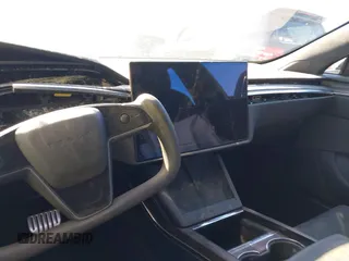 2022 Tesla Model S with VIN 5YJSA1E52NF476906, listed as a IAAI auction lot 41320074 with Not Provided miles and . Bid and sale history available at DreamBid. Image 16.