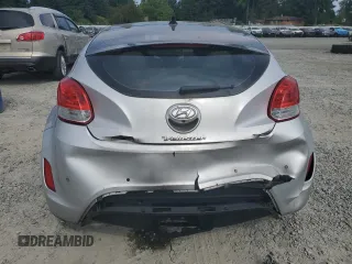 2012 Hyundai Veloster w/Black Int с VIN KMHTC6AD2CU063070, выставлен на аукционе Copart как лот 60391315 с пробегом 153 745 миль миль и Списание • Salvage title. История ставок и продаж доступна на DreamBid. Изображение 6.