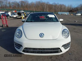 2019 Volkswagen Beetle SE with VIN 3VWJD7AT6KM713525, listed as a IAAI auction lot 41508195 with 73,360 mi miles. Bid and sale history available at carsss.com. Image 12.