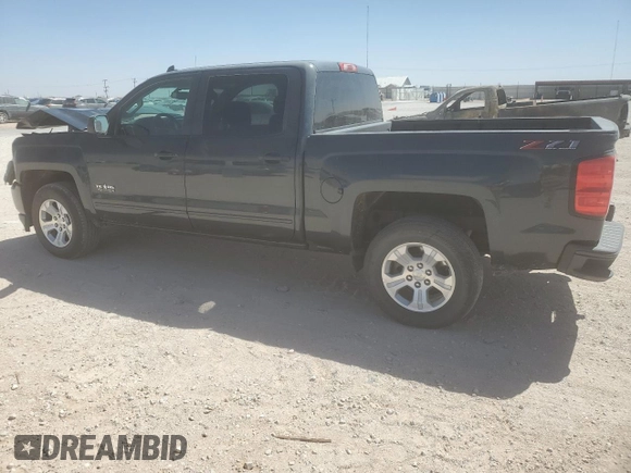 2018 Chevrolet Silverado 1500 LT with VIN 3GCUKREC2JG259864, listed as a Copart auction lot 49451735 with 146,576 mi miles and Salvage Title. Bid and sale history available at DreamBid. Image 2.