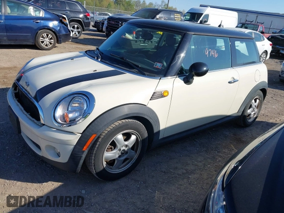 2007 MINI Hardtop with VIN WMWMF33597TU61986, listed as a IAAI auction lot 42139746 with 92,448 mi miles and . Bid and sale history available at DreamBid. Image 2.