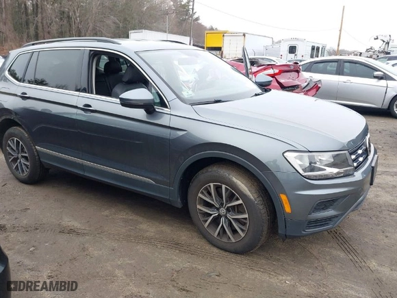 2020 Volkswagen Tiguan SE with VIN 3VV2B7AX2LM086678, listed as a IAAI auction lot 41694051 with 59,495 mi miles. Bid and sale history available at carsss.com. Image 1.