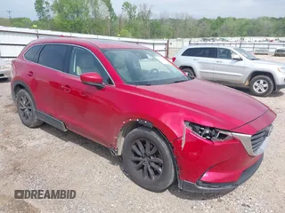 2016 Mazda CX-9 Touring z VIN JM3TCACY0G0101617, wystawiony jako IAAI lot #41850485 z przebiegiem 292 880 mil mil oraz . Historia ofert i sprzedaży dostępna na DreamBid. Obrazek 1.