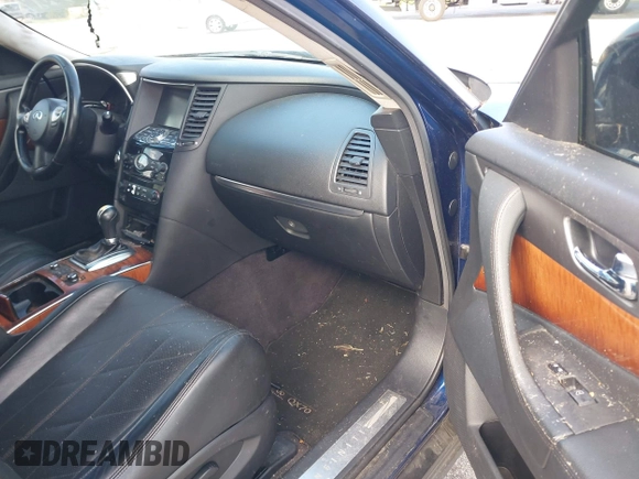 2015 Infiniti QX70 с VIN JN8CS1MU2FM380734, выставлен на аукционе IAAI как лот 42723003 с пробегом 175 469 миль миль и . История ставок и продаж доступна на DreamBid. Изображение 5.