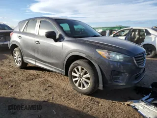 2016 Mazda CX-5 Sport with VIN JM3KE2BE0G0782901, listed as a Copart auction lot 46283615 with 120,335 mi miles and Salvage Title. Bid and sale history available at DreamBid. Image 4.