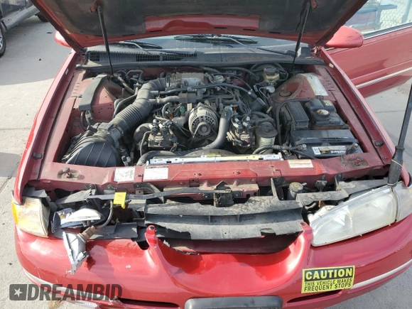 1997 Mercury Cougar z VIN 1MELM62W6VH618680, wystawiony jako Copart lot #53379985 z przebiegiem 123 474 mil mil oraz Szkody całkowita. Historia ofert i sprzedaży dostępna na DreamBid. Obrazek 11.