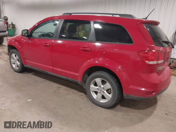 2012 Dodge Journey SXT z VIN 3C4PDDBG4CT397806, wystawiony jako IAAI lot #41333394 z przebiegiem 122 804 mil mil oraz . Historia ofert i sprzedaży dostępna na DreamBid. Obrazek 3.