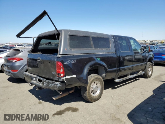 2003 Ford Super Duty F-250 XL with VIN 1FTNW21L93EB52407, listed as a Copart auction lot 70003244 with 460,149 mi miles and Salvage Title. Bid and sale history available at carsss.com. Image 3.