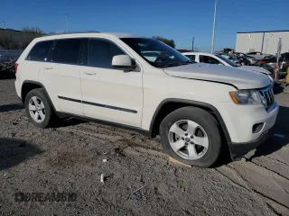 2011 Jeep Grand Cherokee Laredo with VIN 1J4RR4GG5BC503705, listed as a Copart auction lot 50014895 with 180,999 mi miles and Salvage title. Bid and sale history available at DreamBid. Image 4.