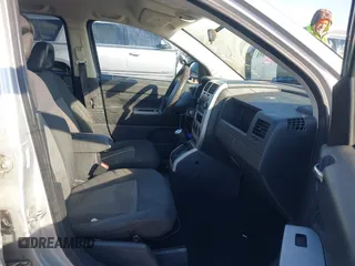2008 Jeep Compass Sport with VIN 1J8FT47098D665734, listed as a IAAI auction lot 41561801 with 169,446 mi miles. Bid and sale history available at carsss.com. Image 5.