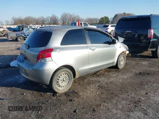 2009 Toyota Yaris with VIN JTDJT903695269078, listed as a IAAI auction lot 41431408 with 231,791 mi miles. Bid and sale history available at carsss.com. Image 4.