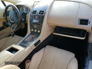2008 Aston Martin Vantage z VIN SCFBF04B18GD08076, wystawiony jako Copart lot #70620153 z przebiegiem Nie podano mil oraz . Historia ofert i sprzedaży dostępna na DreamBid. Obrazek 8.