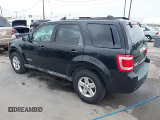 2008 Ford Escape Hybrid with VIN 1FMCU49H38KE50450, listed as a IAAI auction lot 42565336 with Not provided miles and . Bid and sale history available at DreamBid. Image 3.