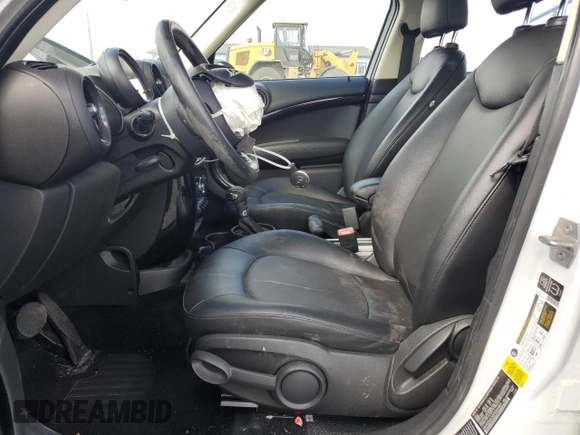 2015 MINI Countryman with VIN WMWZB3C50FWR44801, listed as a Copart auction lot 51957715 with 69,537 mi miles and Salvage Title. Bid and sale history available at DreamBid. Image 7.