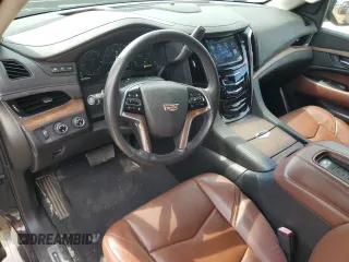 2015 Cadillac Escalade Premium z VIN 1GYS4NKJ3FR576518, wystawiony jako Copart lot #53972985 z przebiegiem 79 763 mil mil oraz Czysty tytuł • Clean title. Historia ofert i sprzedaży dostępna na DreamBid. Obrazek 8.