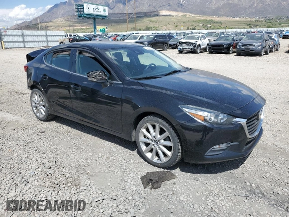 2017 Mazda 3 Touring z VIN 3MZBN1V79HM124716, wystawiony jako Copart lot #54564155 z przebiegiem 80 625 mil mil oraz Szkoda całkowita • Salvage title. Historia ofert i sprzedaży dostępna na DreamBid. Obrazek 4.