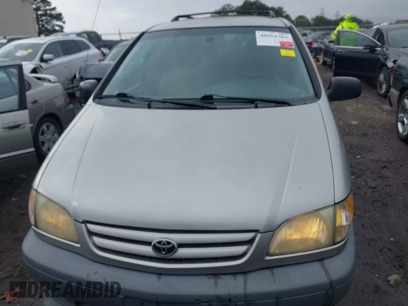 2003 Toyota Sienna CE with VIN 4T3ZF19C93U551570, listed as a IAAI auction lot 40961703 with 285,644 mi miles. Bid and sale history available at carsss.com. Image 12.