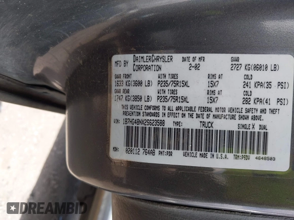 2002 Dodge Dakota SLT z VIN 1B7HG48NX2S623588, wystawiony jako IAAI lot #41793068 z przebiegiem 213 159 mil mil oraz . Historia ofert i sprzedaży dostępna na DreamBid. Obrazek 9.